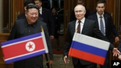 Sjevernokorejski lider Kim Džong Un i predsjednik Rusije Vladimir Putin u Pjongjangu, 19. juni 2024. 