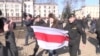 Belarusian police arrest opposition marchers in Minsk.