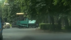 Расследование. Зачем подозревавшийся в коррупции чиновник заасфальтировал территорию ГКНБ?