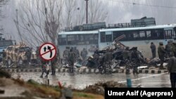 The wreckage of a bus after an attack that killed more than 40 Indian soldiers on February 14