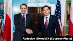Міністар замежных справаў Польшчы Радослаў Сікорскі і дзяржаўны сакратар ЗША Марка Рубіё, архіўнае фота