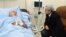 Armenia - President Serzh Sarkisian (R) visits wounded opposition presidential candidate Paruyr Hayrikian at a Yerevan hospital, 01Feb2013.