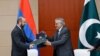 China - The foreign ministers of Armenia and Pakistan sign an agreement to establish diplomatic relations between their countries, Tianjin, August 31, 2025.
