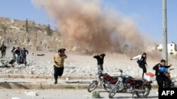 از بمباران‌های حومه حلب توسط نیروهای دولتی سوریه