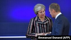 Британиянын премьер-министри Тереза Мэй жана Еврокеңештин төрагасы Дональд Туск. 19-октябрь, 2018-жыл.