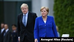 Борис Джонсон и Ангела Меркель