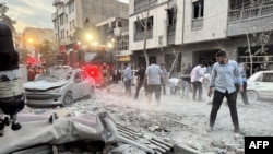 Исроил ҳаво ҳужумларига нишон бўлган Теҳрондаги турар-жой мавзеи.