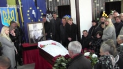 Ukrainians Mourn Slain Activist Targeted In Acid Attack