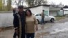 Murod Juraev (left) upon his release from prison in 2015. 