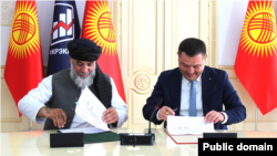 Ноуреддин Азизи жана Бакыт Сыдыков.