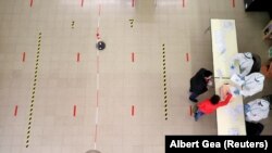 رأی‌گیری به دلیل شیوع ویروس کرونا با رعایت مقررات بهداشتی و فاصله‌گیری اجتماعی انجام شد