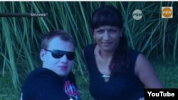 Юрий Глазев ва Фирӯза Савушкина.