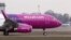 Ukraine -- A Wizz Air Airbus A320 aircraft landing on the runway of Kiev International Airport on 15Mar2014