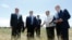 Armenia - Prime Minister Hovik Abrahamian (second from left) inspects a wheat field in Shirak province seriously damaged by a hailstorm, 9Jul2014