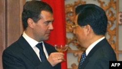 رییس جمهوری جدید روسیه در اولین سفر خارجی خود وارد چین شد. (عکس از AFP)