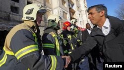 Ріші Сунак зустрічається з рятувальниками в Києві, 12 січня