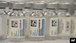 U.S. - Vials of Johnson & Johnson COVID-19 vaccine sit in the pharmacy of National Jewish Hospital for distribution on March 6, 2021, in Denver. 