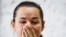 BELARUS -- Presidential candidate Svyatlana Tsikhanouskaya reacts during a news conference after the Belarusian presidential election in Minsk, August 10, 2020
