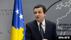 Kosovo Prime Minister Albin Kurti says a tariff on Serbian goods has been lifted, but Belgrade rejected the announcement.