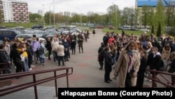 Dozens of people came to the courthouse to support the 12 defendants on May 14. 