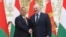 Belarusian President Alyaksandr Lukashenka (right) and Hungarian Prime Minister Viktor Orban pose for a photo during their meeting in Minsk on June 5. 