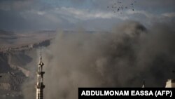 تصویری آرشیوی از منطقه غوطه شرقی پس از یک حمله هوایی