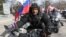 Aleksandr Zaldostanov, the leader of the Night Wolves biker group, takes part in a commemoration ceremony for soldiers killed during World War II memorial in Sevastopol, Crimea, in March.