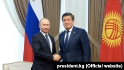 Владимир Путин жана Сооронбай Жээнбеков. 28-март, 2019-жыл. Бишкек, Кыргызстан. 