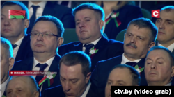 Скрыншот з трансьляцыі дзяржаўнага тэлеканалу СТВ, на якім Валер Сьцепановіч (уверсе ў цэнтры) заўважаны падчас звароту Аляксандра Лукашэнкі да «народу і Нацыянальнага сходу» ў Палацы Рэспублікі 28 студзеня 2022. Крыніца: тэлеканал СТВ