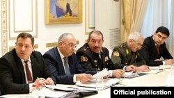 Generals Artur Baghdasarian (center) and Aleksan Aleksanian (second from right) at a meeting with Prime Minister Nikol Pashinian in Yerevan on February 17.