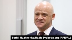 Суд постановив також повернути заставу і зняти арешт з майна обвинувачених