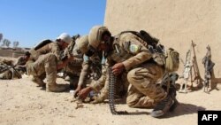 کماندوهای ارتش افغانستان در میانه یک درگیری با طالبان