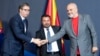 Serbian President Aleksandar Vucic (left), North Macedonia's prime minister, Zoran Zaev (center), and Albanian Prime Minister Edi Rama pose for photographers after signing documents during the Skopje Economic Forum on Regional Cooperation on July 29. 