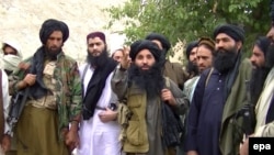 Pakistani Taliban chief Mullah Fazlullah (center) is shown at an undisclosed location on Pakistani-Afghan border.