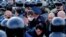 Riot police confront participants in the April 2020 rally protesting coronavirus measures in Vladikavkaz.