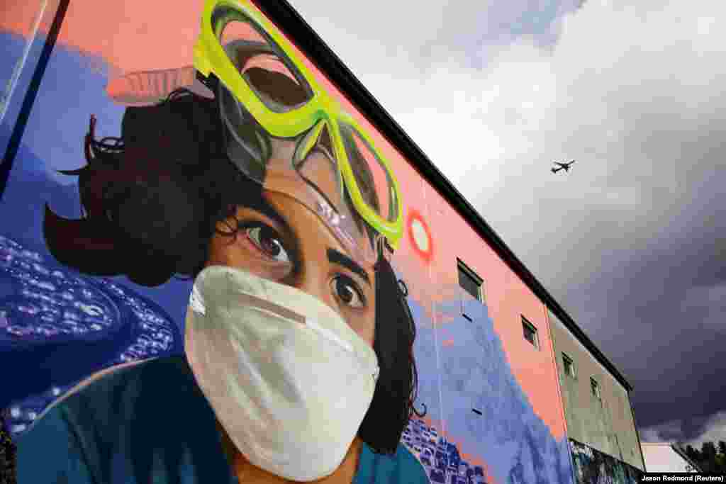 Фреска &laquo;Моя дитина, наше повітря&raquo; Крейга Кандіффа, намальована в районі Джорджтаун у Сіетлі, США, 24 березня 2020 року