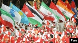 نمایی از افتتاحیه بازی های آسیایی در قطر.