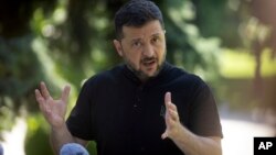 Ukrainian President Volodymyr Zelenskyy meets reporters in Kyiv on August 29.