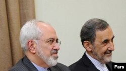 علی اکبر ولایتی، مشاور رهبر جمهوری اسلامی و محمدجواد ظریف، وزیر خارجه ایران