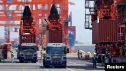 В Токийском порту идет загрузка автомобилей, 2013. Иллюстративное фото.