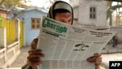 Ооганстанда АКШ президенти Барак Обаманын сүрөтү басылган кайрылуусун окугандар көп. 2-декабр, 2009-ж.