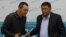 Өмүрбек Бабанов (сол жақта) пен Камчыбек Ташиев. Бішкек, 28 қыркүйек 2016 жыл.