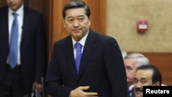 Қазақстан президенті Нұрсұлтан Назарбаевтың парламент сессиясында Серік Ахметовті премьерлікке ұсынған сәті. Астана, 24 қыркүйек 2014 жыл.  