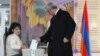 Armenia -- Armenian President Serzh Sarkisian casts a ballot during a referendum on constitutional changes in Yerevan, December 6, 2015.