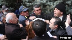 Armenia - Riot police and opposition activists scuffle in Yerevan's Liberty Square, 14Mar2013.