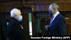 Главы МИД России и Ирана Сергей Лавров (справа) и Мохаммад Джавад Зариф, Москва, 26 января 2021 г. 
