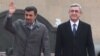 Armenia - President Serzh Sarkisian (R) meets his visiting Iranian counterpart Mahmud Ahmadinejad in Yerevan,23Dec2011.