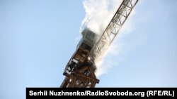 Фоторепортаж: як на будівництві в Києві активісти захопили кран