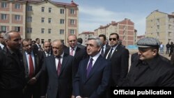 Armenia - President Serzh Sarkisian inspects new apartment blocks constructed in Gyumri, 7Apr2012. 