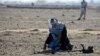 Security personnel clear mines from a field in Afghanistan, which is one of the most heavily mined countries in the world. (file photo)
